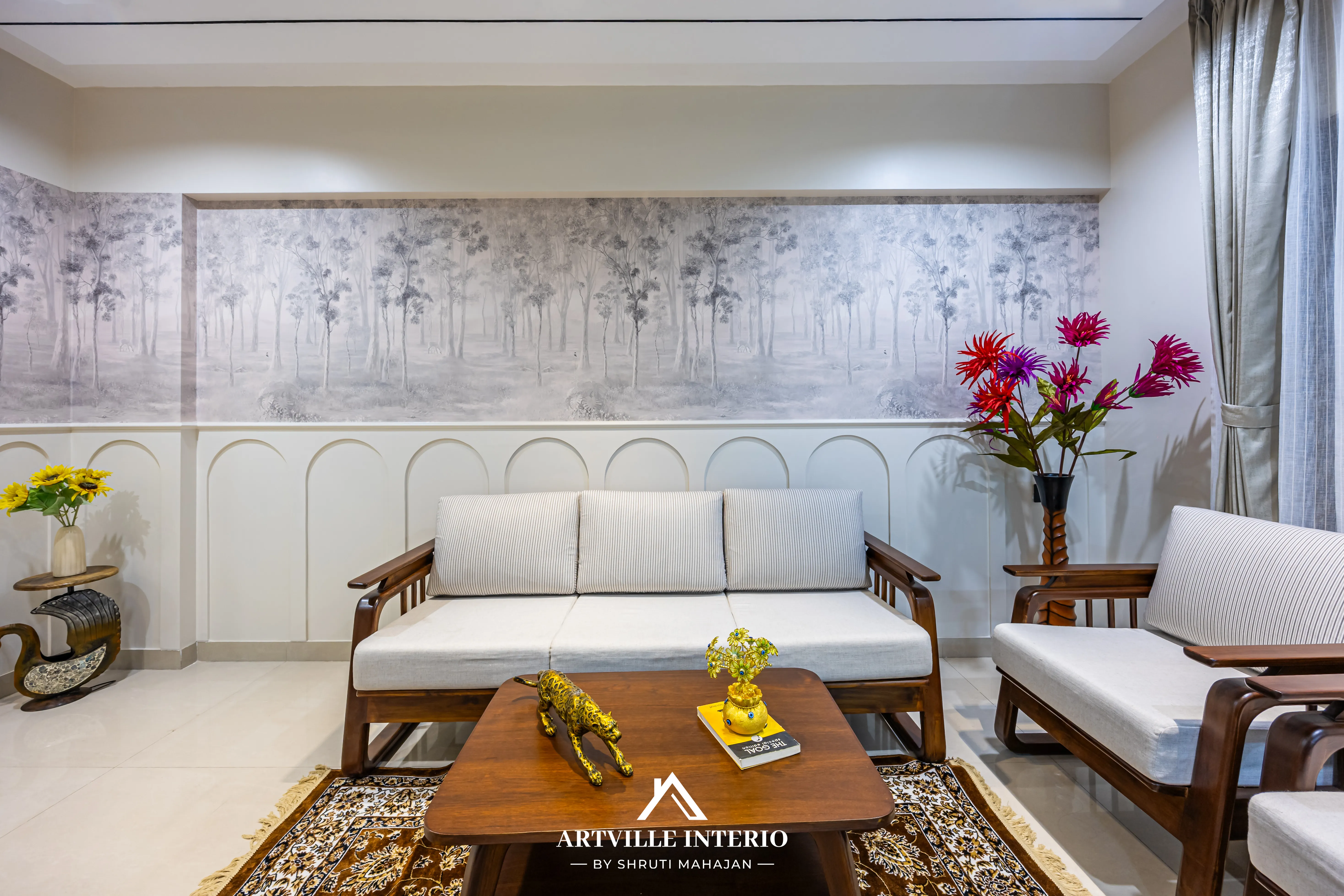 Cozy yet modern living area layout featuring handle-less custom TV console unit and warm accents