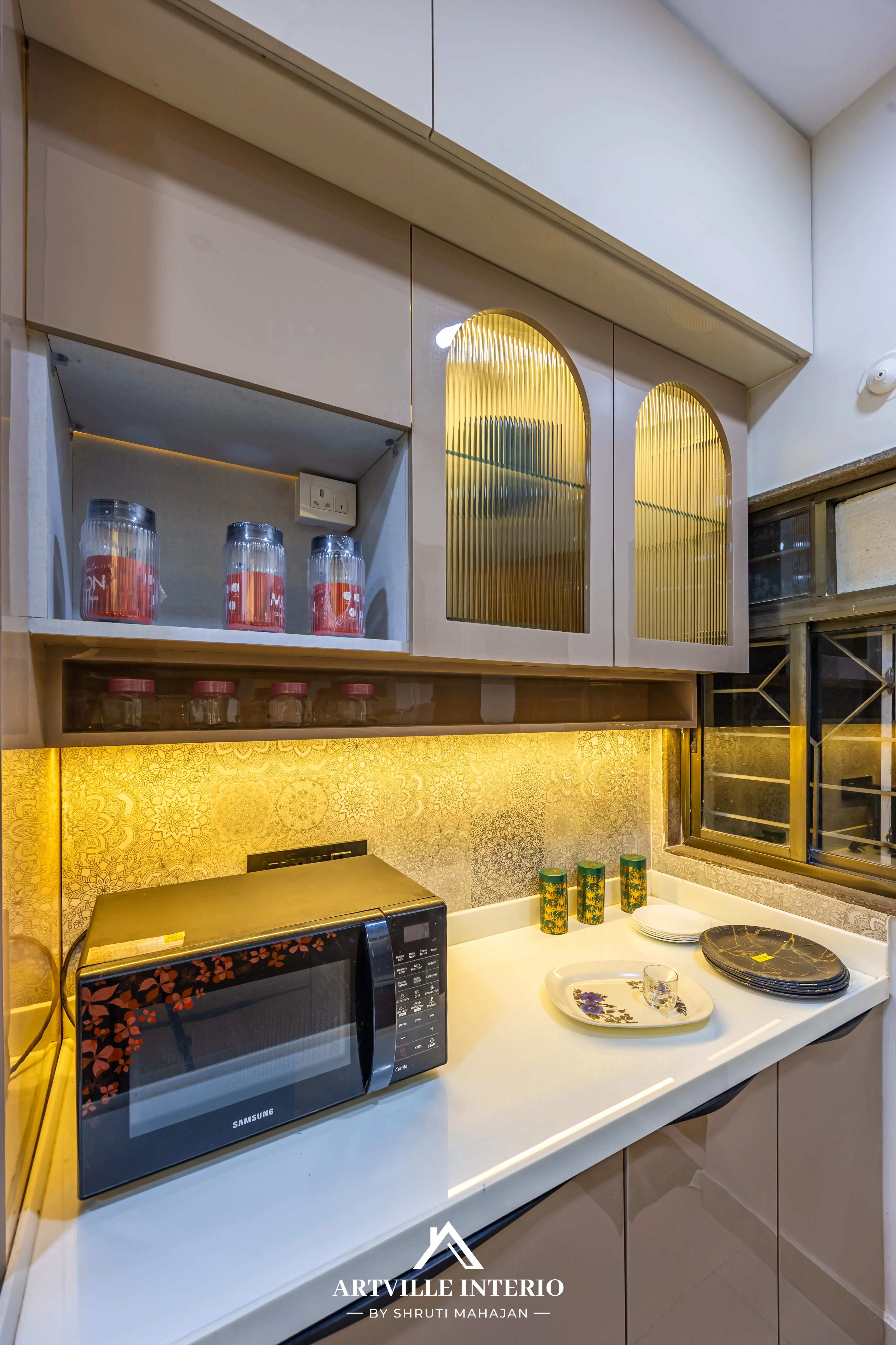 Modern modular kitchen detailing with soft-close grey overhead shutters